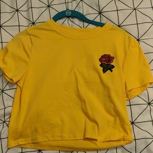 Yellow shirt with rose patch